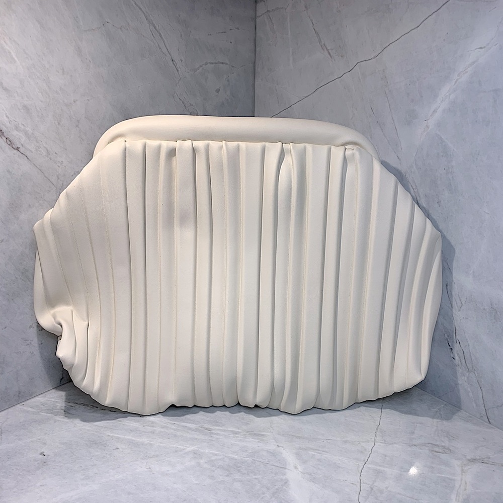 Accordion pleat clutch in a creamy white, roomy with interior zipped pocket